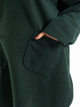 Oversized Pocketed Sweater in dark green, orange, gray, or green—relaxed fit with front pockets for bold winter layering