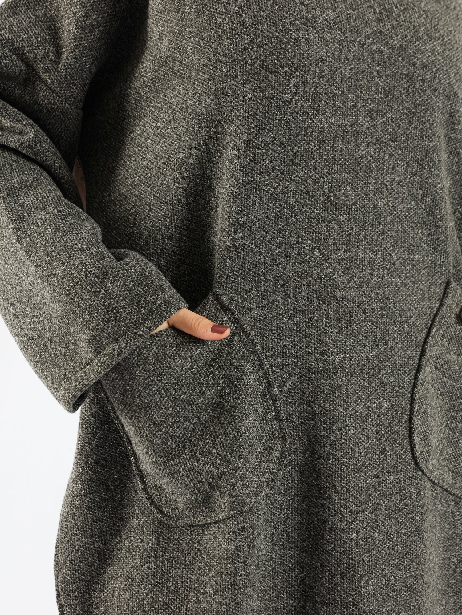 Oversized Pocketed Sweater in dark green, orange, gray, or green—relaxed fit with front pockets for bold winter layering