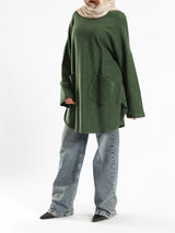 Oversized Pocketed Sweater in dark green, orange, gray, or green—relaxed fit with front pockets for bold winter layering