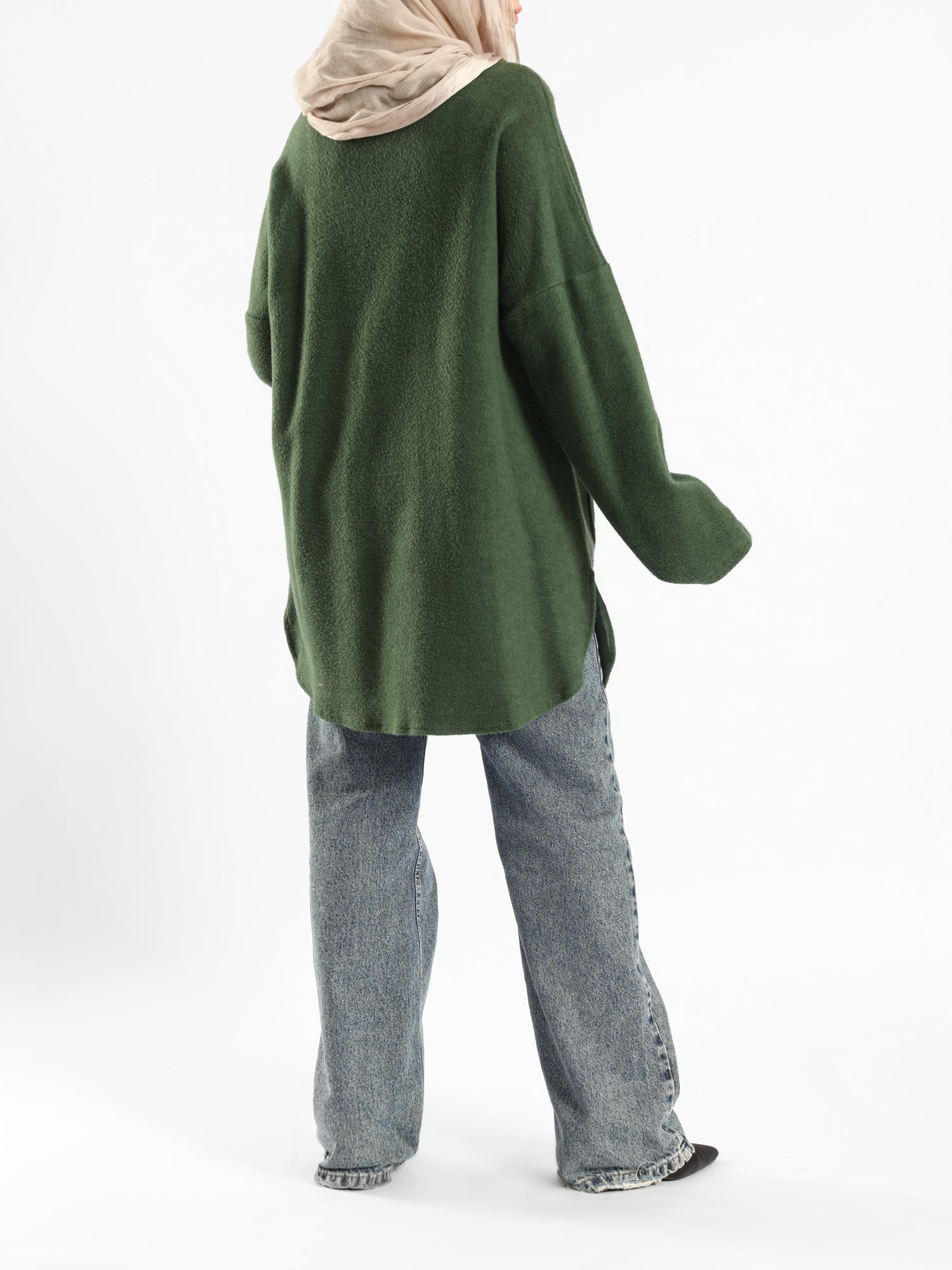 Oversized Pocketed Sweater in dark green, orange, gray, or green—relaxed fit with front pockets for bold winter layering