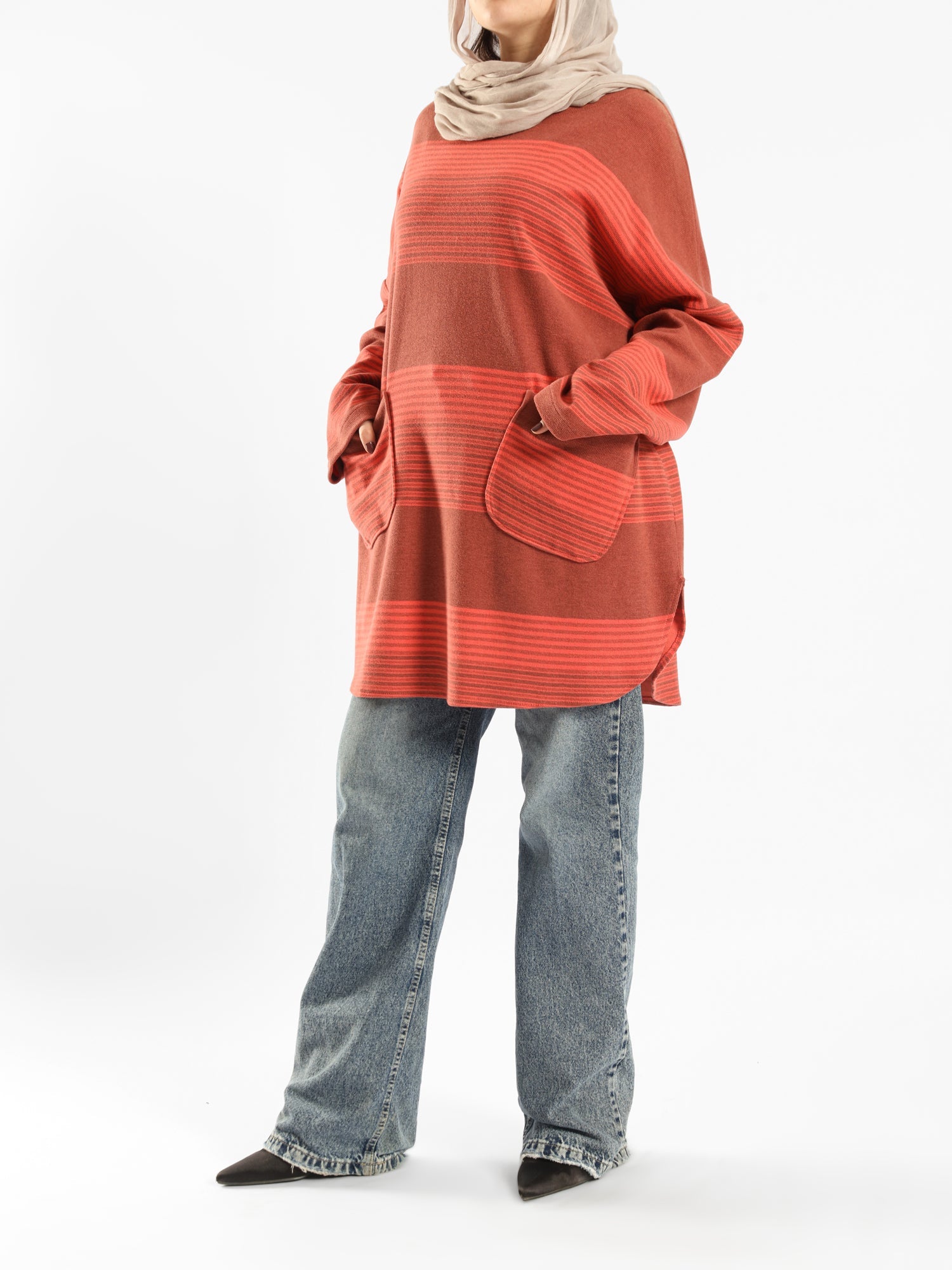 Oversized Pocketed Sweater in dark green, orange, gray, or green—relaxed fit with front pockets for bold winter layering