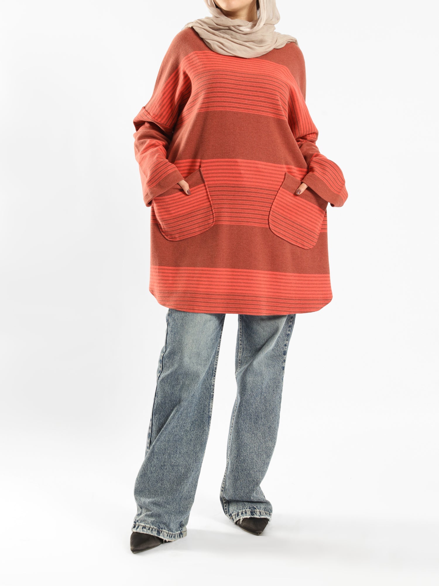 Oversized Pocketed Sweater in dark green, orange, gray, or green—relaxed fit with front pockets for bold winter layering