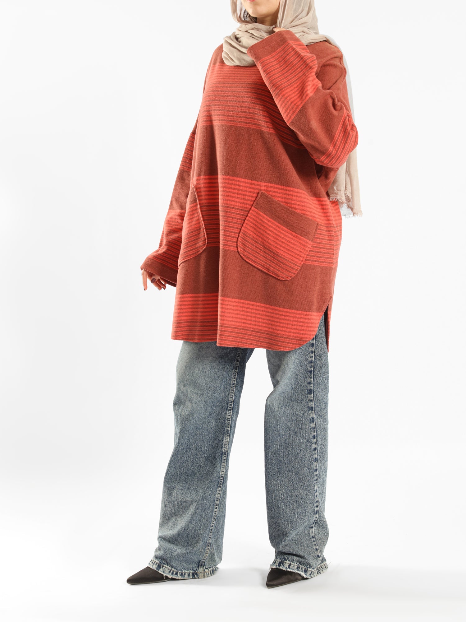 Oversized Pocketed Sweater in dark green, orange, gray, or green—relaxed fit with front pockets for bold winter layering