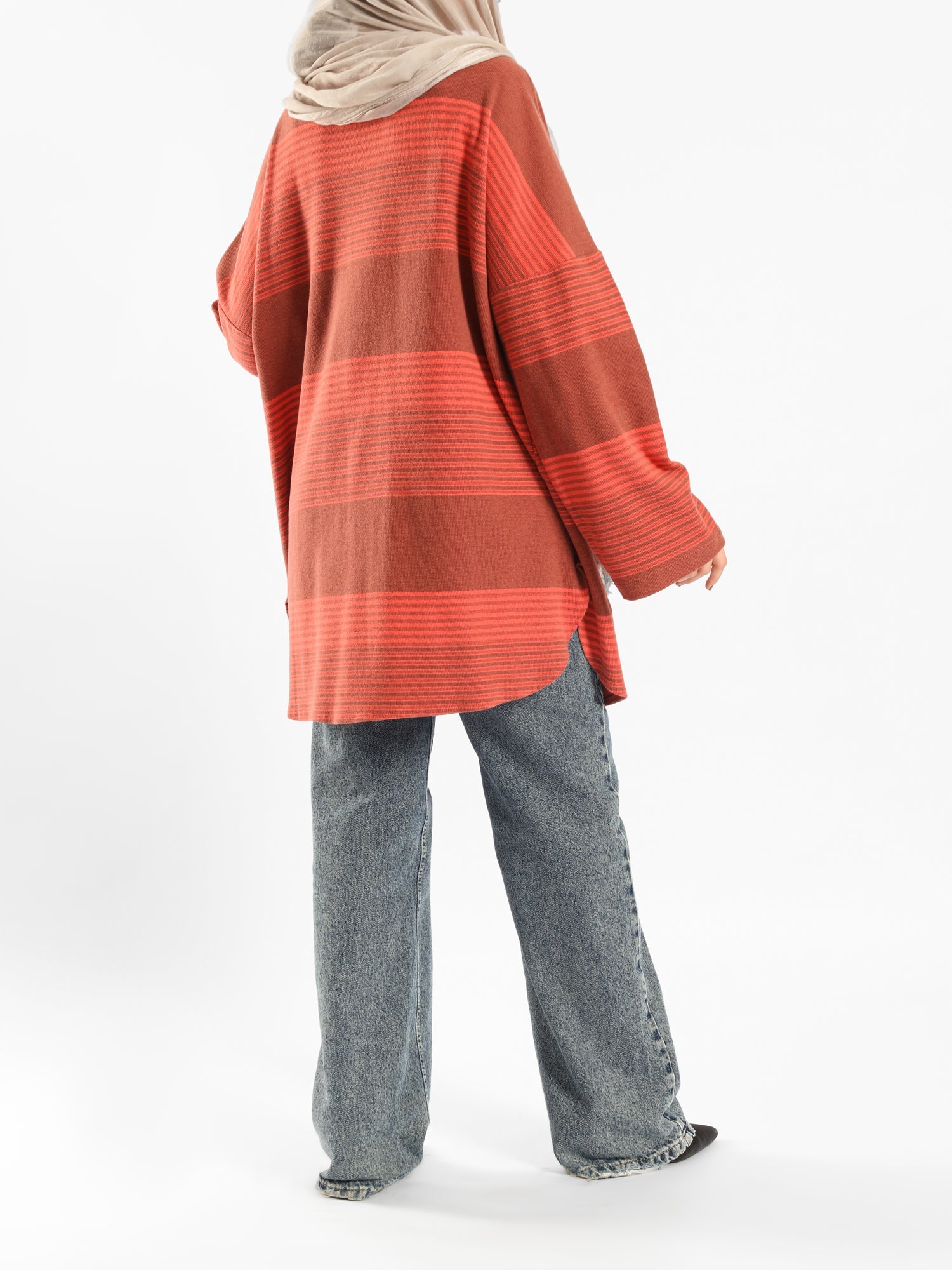 Oversized Pocketed Sweater in dark green, orange, gray, or green—relaxed fit with front pockets for bold winter layering