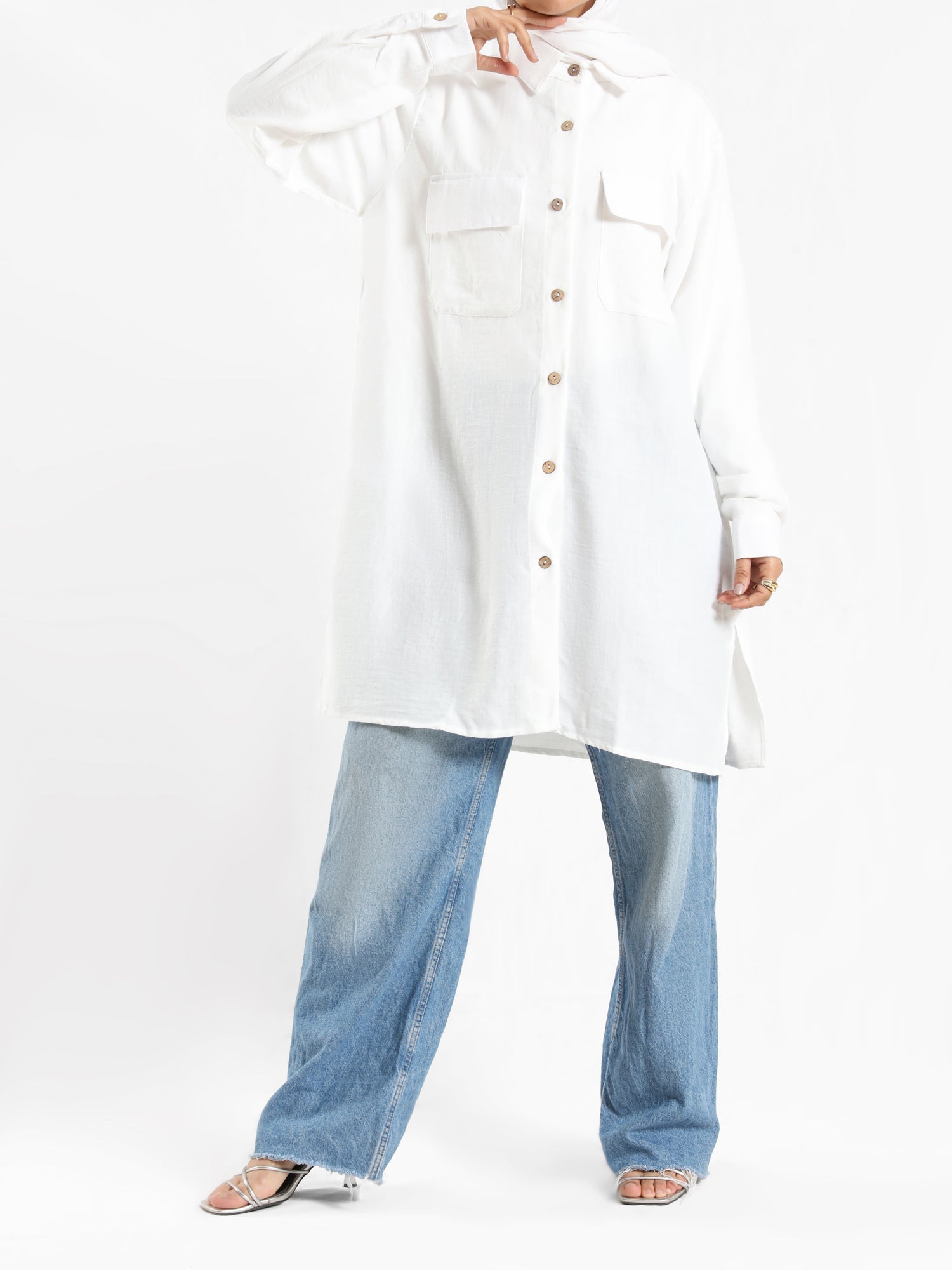 Petal Pocket Blouse in linen blend with front pockets, a relaxed-fit modest top in baby blue, mauve, or white for summer wear