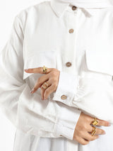 Petal Pocket Blouse in linen blend with front pockets, a relaxed-fit modest top in baby blue, mauve, or white for summer wear