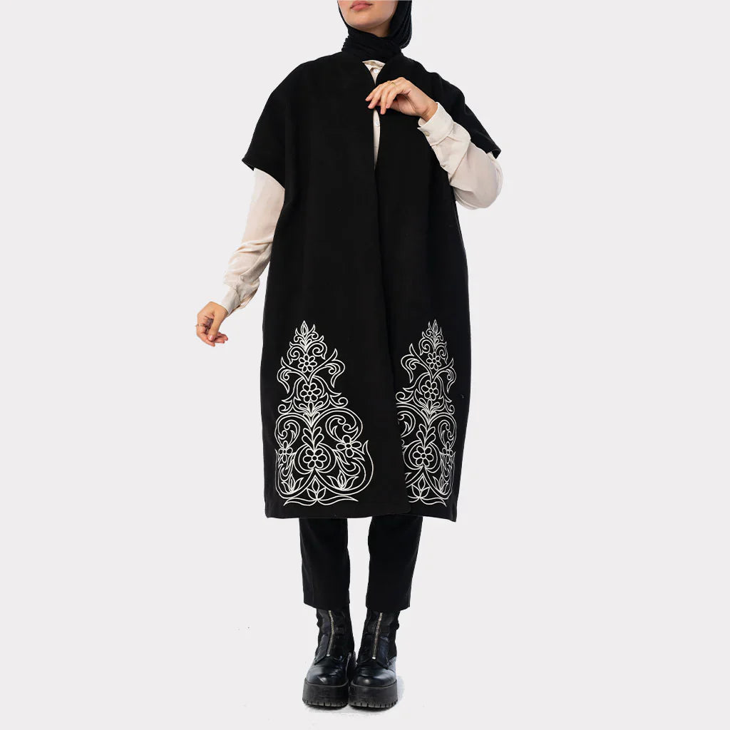 Royal Embroidered Wool Poncho in soft wool with ornate detailing and flowing silhouette—modest winter elegance in black or grey