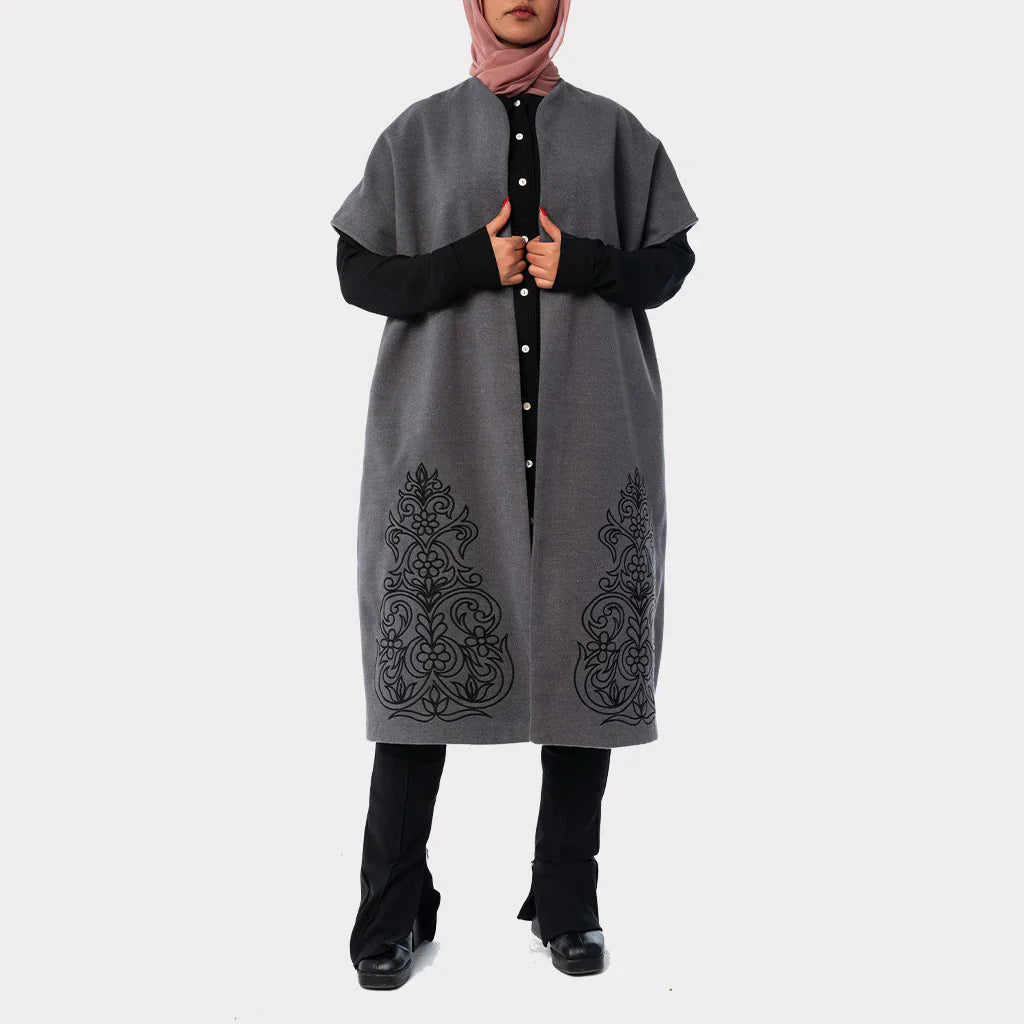 Royal Embroidered Wool Poncho in soft wool with ornate detailing and flowing silhouette—modest winter elegance in black or grey