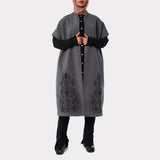Royal Embroidered Wool Poncho in soft wool with ornate detailing and flowing silhouette—modest winter elegance in black or grey