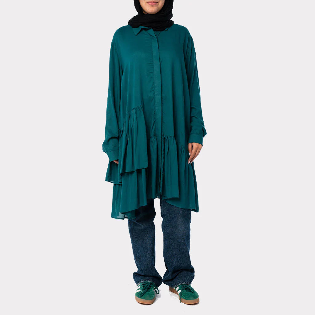 Ruffle Shirt in soft, breathable fabric with delicate frill accents, available in serene summer tones for a feminine modest look