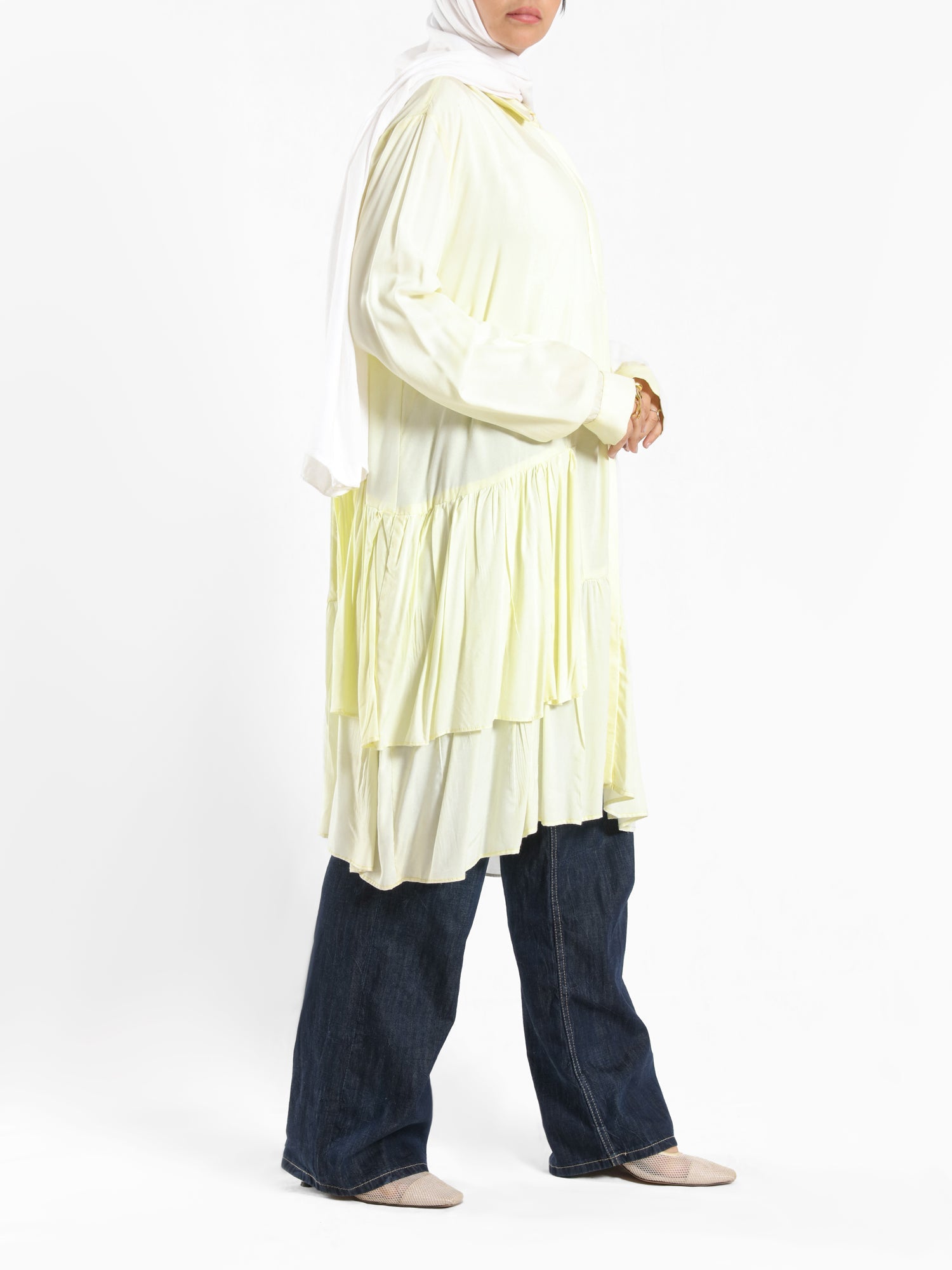 Ruffle Shirt in soft, breathable fabric with delicate frill accents, available in serene summer tones for a feminine modest look