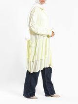 Ruffle Shirt in soft, breathable fabric with delicate frill accents, available in serene summer tones for a feminine modest look