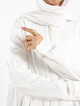 Ruffle Shirt in soft, breathable fabric with delicate frill accents, available in serene summer tones for a feminine modest look