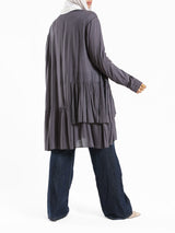 Ruffle Shirt in soft, breathable fabric with delicate frill accents, available in serene summer tones for a feminine modest look