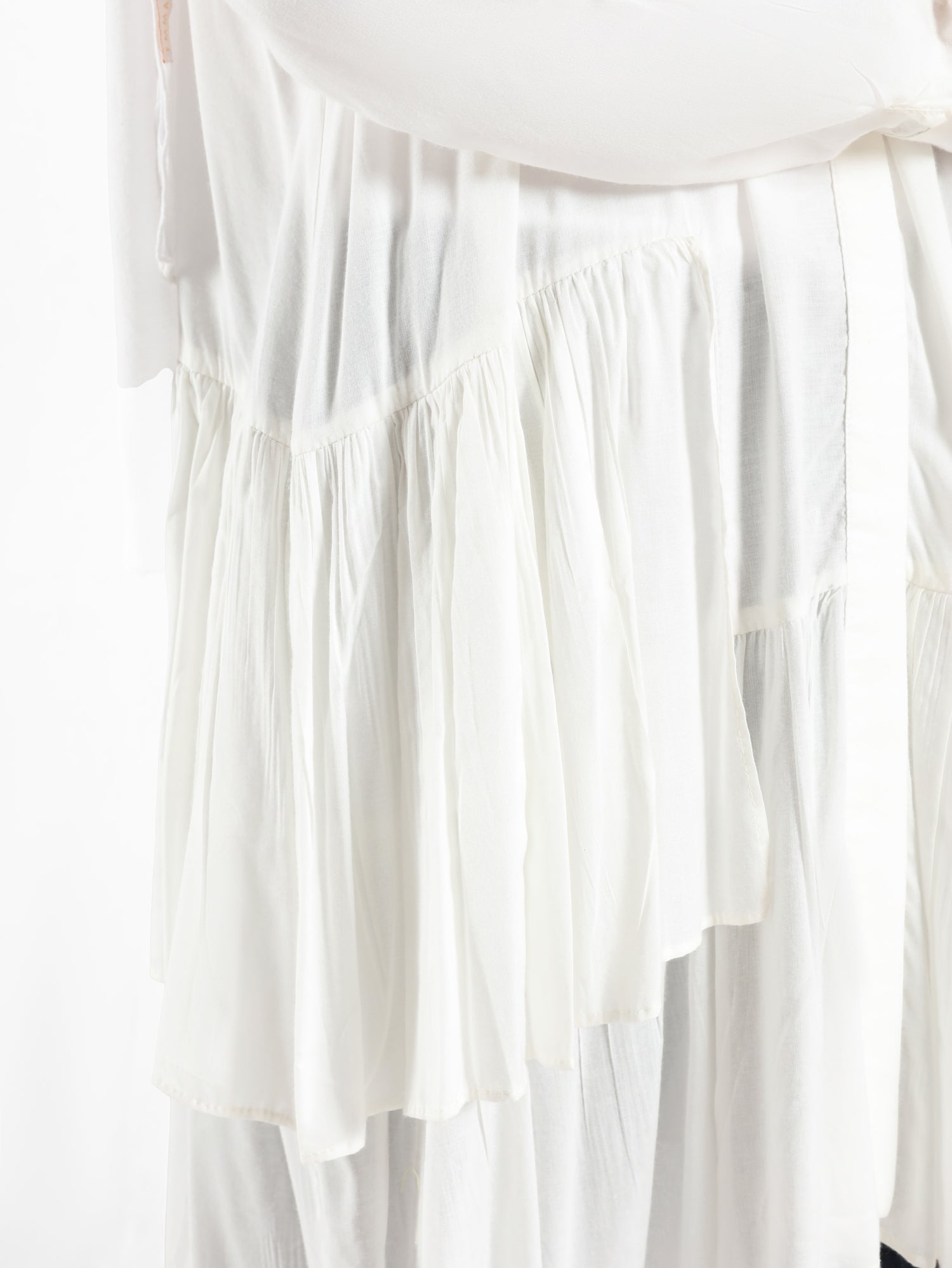 Ruffle Shirt in soft, breathable fabric with delicate frill accents, available in serene summer tones for a feminine modest look