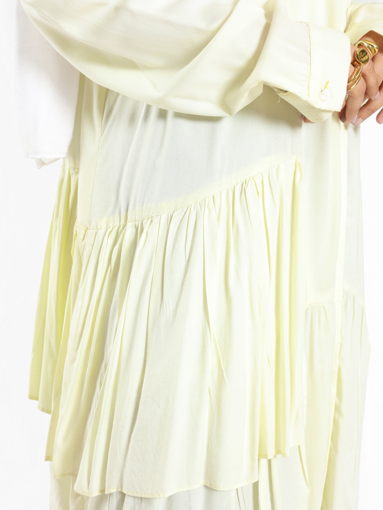 Ruffle Shirt in soft, breathable fabric with delicate frill accents, available in serene summer tones for a feminine modest look