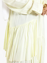 Ruffle Shirt in soft, breathable fabric with delicate frill accents, available in serene summer tones for a feminine modest look