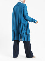 Ruffle Shirt in soft, breathable fabric with delicate frill accents, available in serene summer tones for a feminine modest look