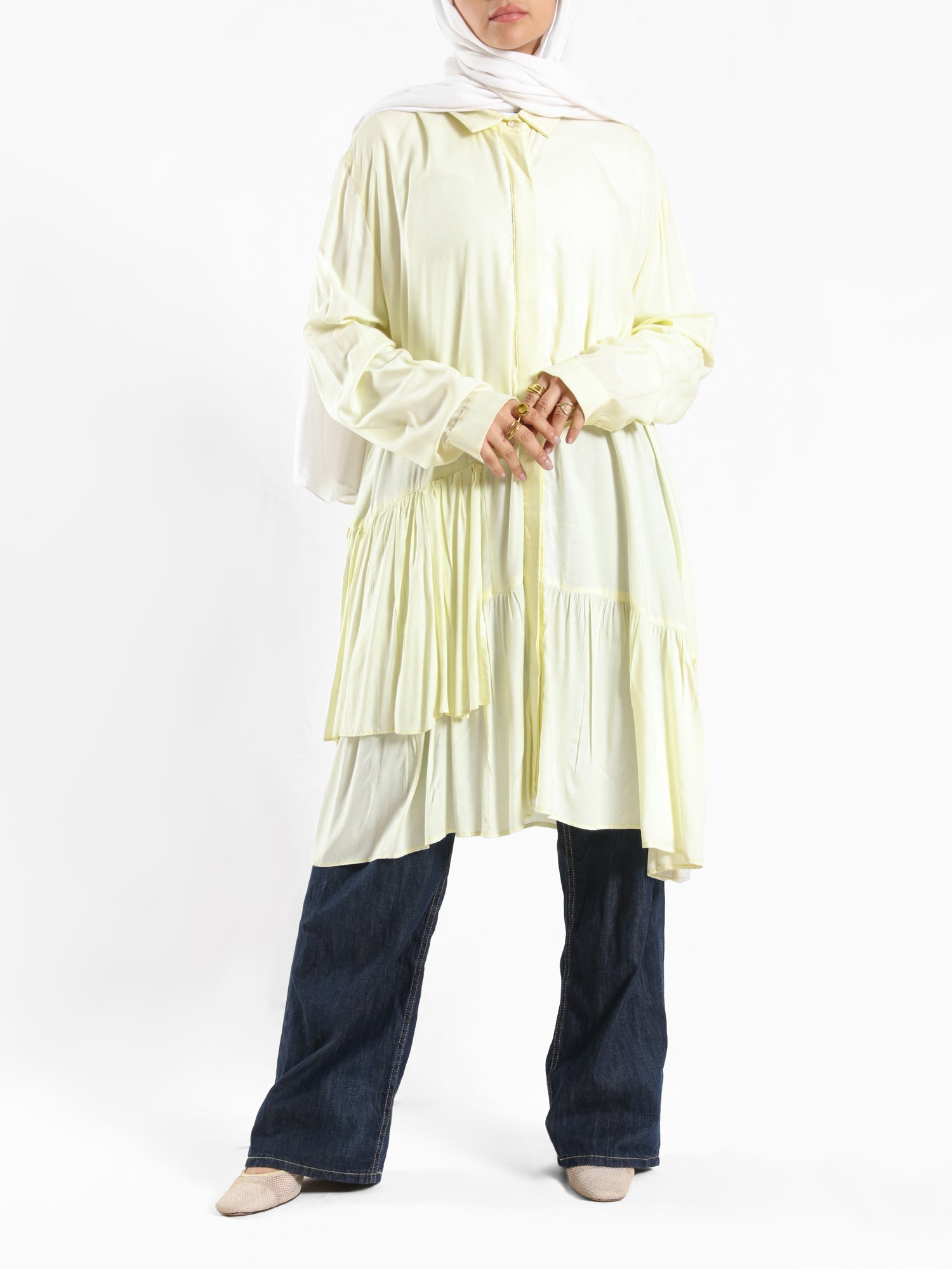 Ruffle Shirt in soft, breathable fabric with delicate frill accents, available in serene summer tones for a feminine modest look