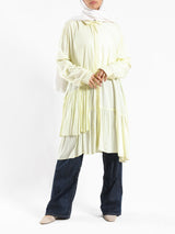 Ruffle Shirt in soft, breathable fabric with delicate frill accents, available in serene summer tones for a feminine modest look