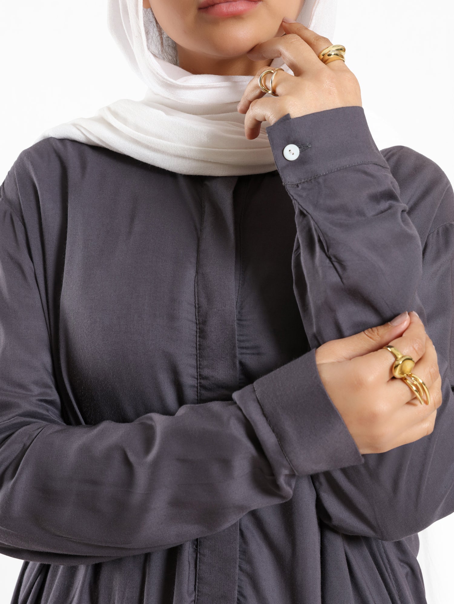 Ruffle Shirt in soft, breathable fabric with delicate frill accents, available in serene summer tones for a feminine modest look