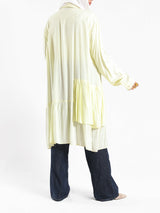 Ruffle Shirt in soft, breathable fabric with delicate frill accents, available in serene summer tones for a feminine modest look