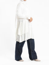 Ruffle Shirt in soft, breathable fabric with delicate frill accents, available in serene summer tones for a feminine modest look