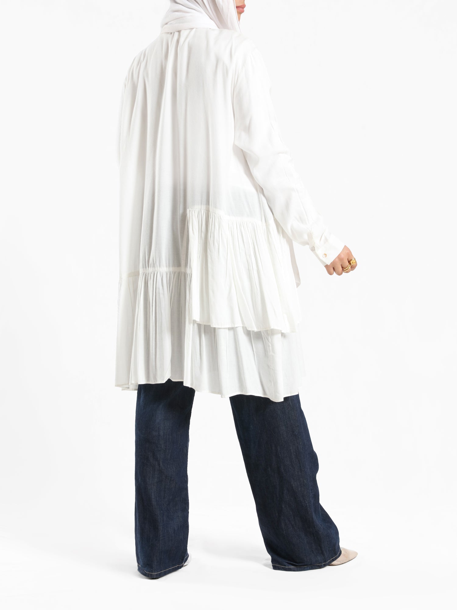 Ruffle Shirt in soft, breathable fabric with delicate frill accents, available in serene summer tones for a feminine modest look