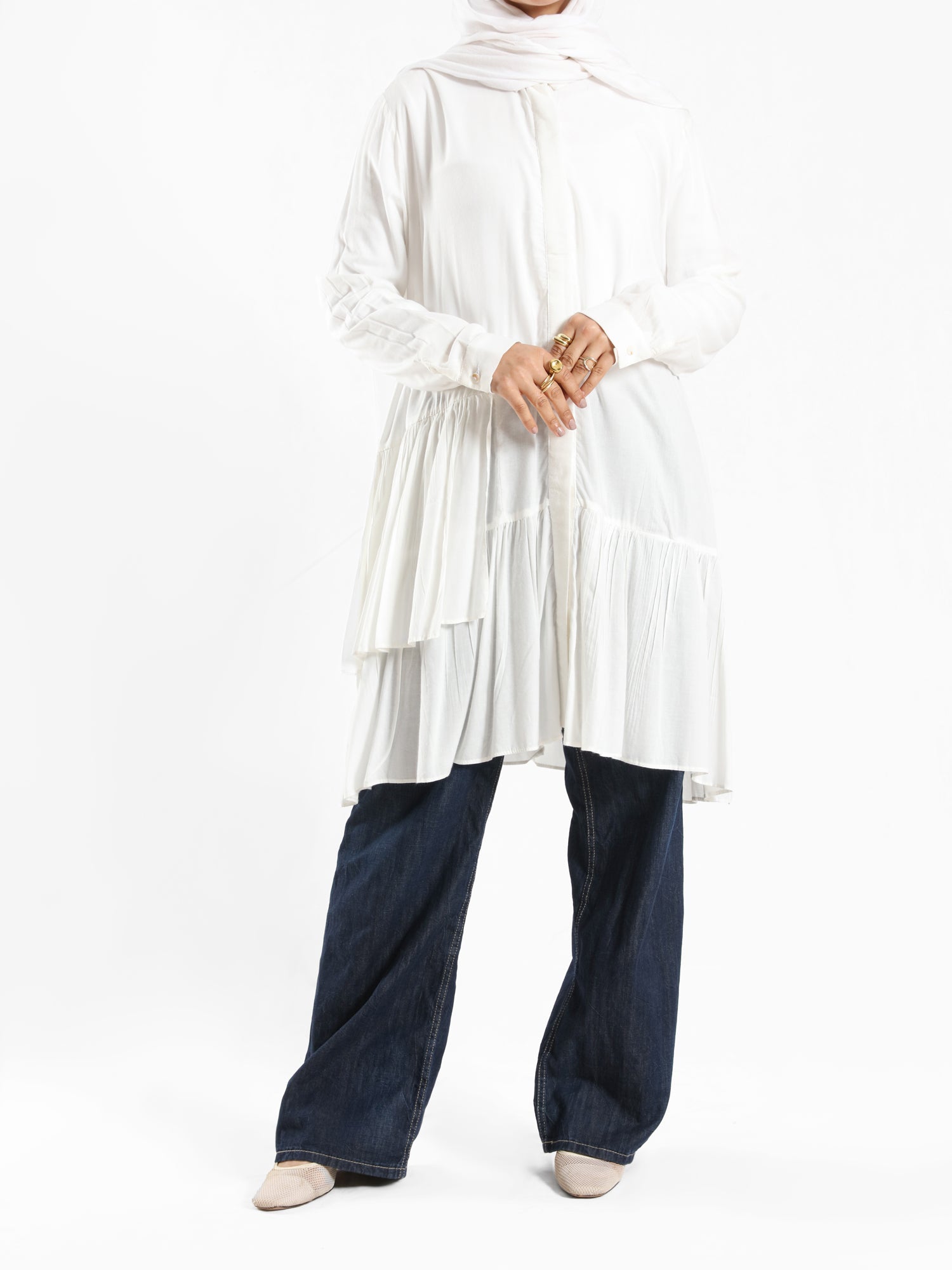Ruffle Shirt in soft, breathable fabric with delicate frill accents, available in serene summer tones for a feminine modest look