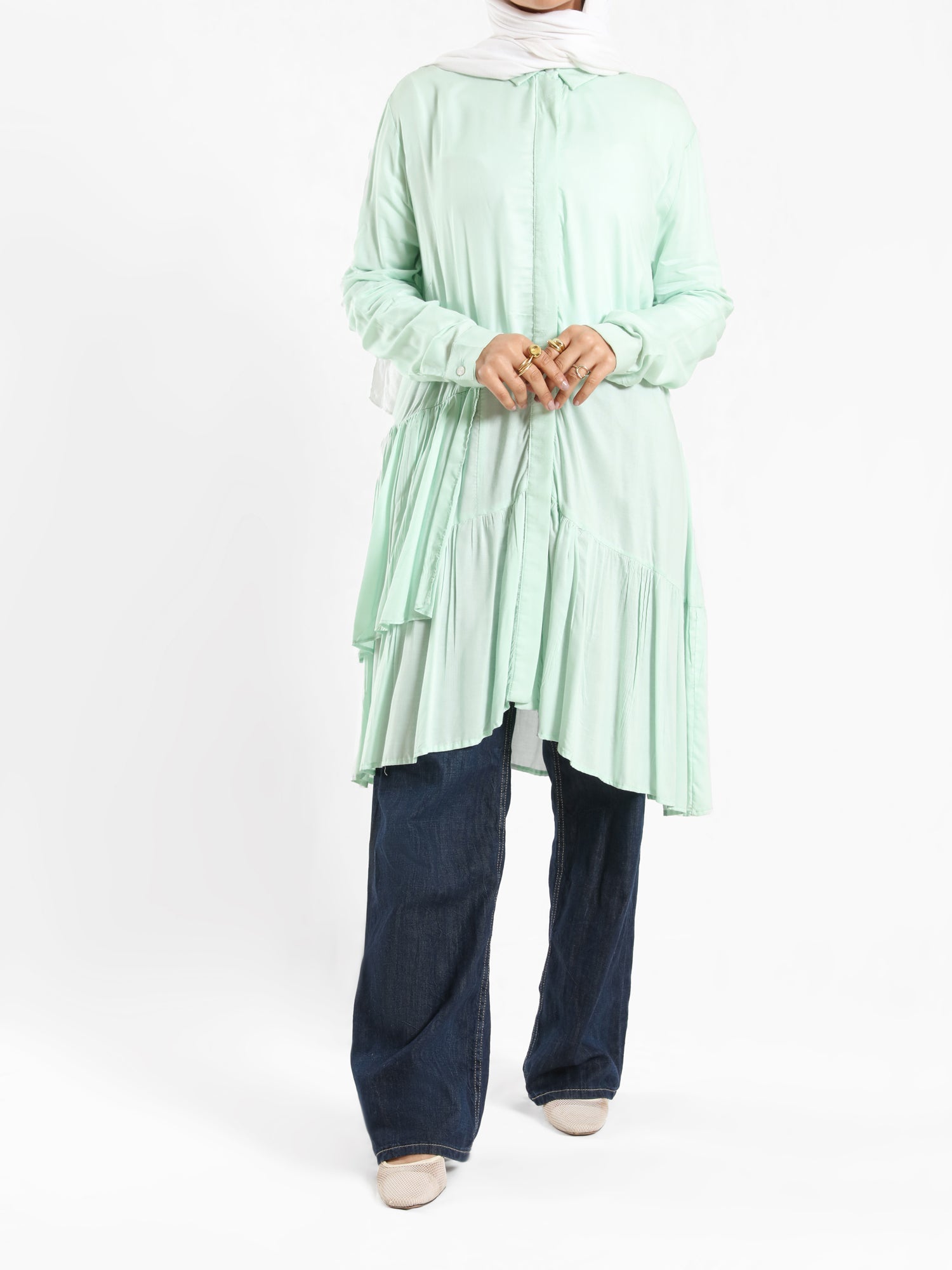 Ruffle Shirt in soft, breathable fabric with delicate frill accents, available in serene summer tones for a feminine modest look