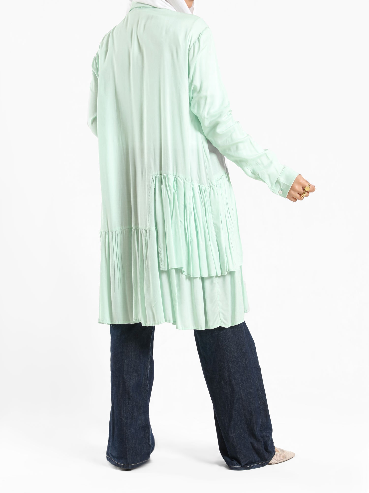 Ruffle Shirt in soft, breathable fabric with delicate frill accents, available in serene summer tones for a feminine modest look