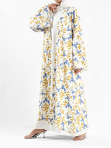 Sunset Kimono Breeze in printed plasma fabric with vibrant hues—lightweight and modest for summer evenings