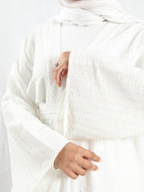 Sunset Kimono Breeze in printed plasma fabric with vibrant hues—lightweight and modest for summer evenings