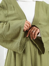 Sunset Kimono Breeze in printed plasma fabric with vibrant hues—lightweight and modest for summer evenings