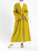 Sunset Kimono Breeze in printed plasma fabric with vibrant hues—lightweight and modest for summer evenings