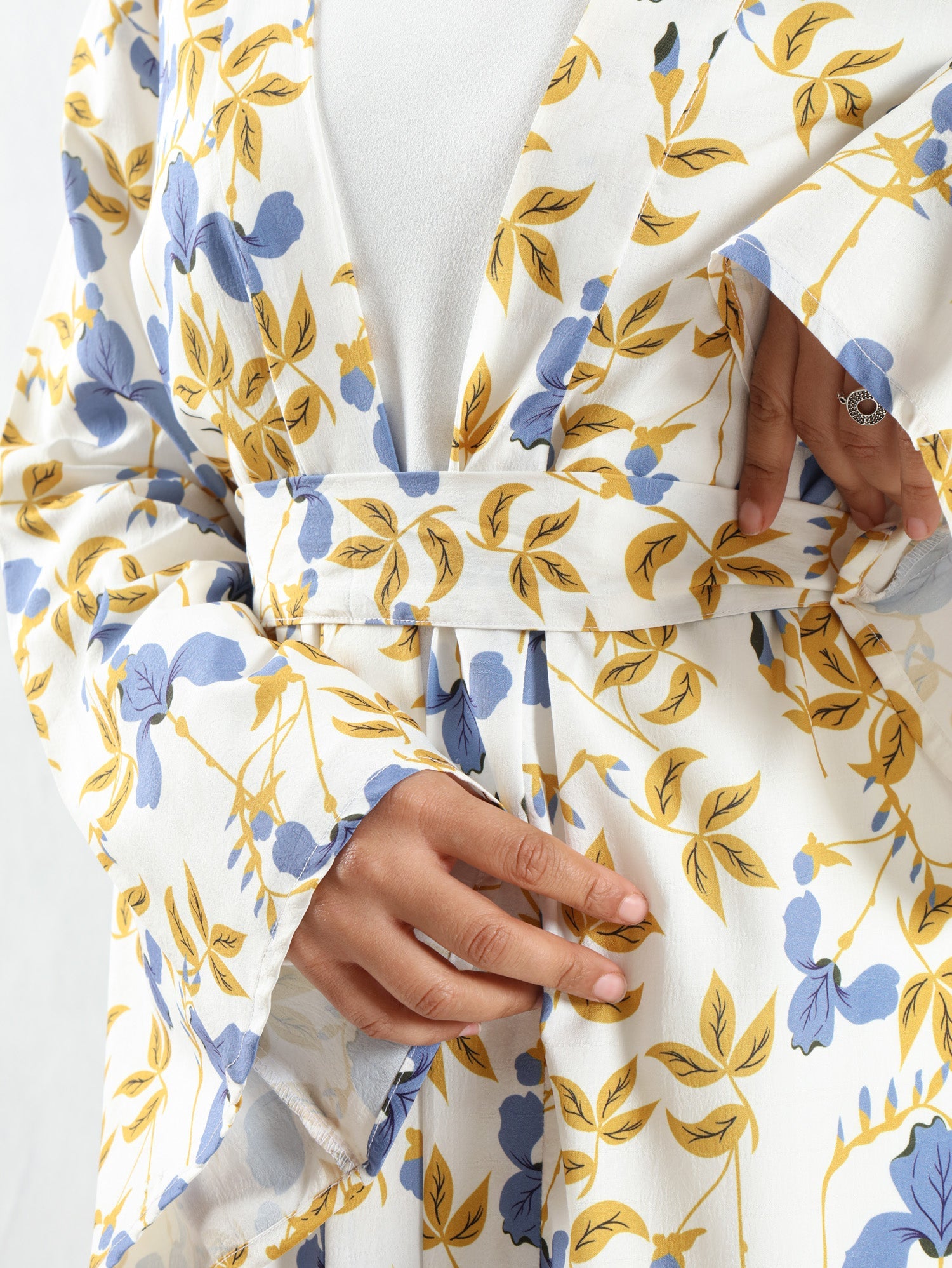 Sunset Kimono Breeze in printed plasma fabric with vibrant hues—lightweight and modest for summer evenings