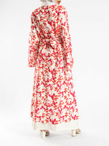 Sunset Kimono Breeze in printed plasma fabric with vibrant hues—lightweight and modest for summer evenings